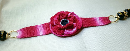 Bracelet Anémone dégradé de rouge perles d'onyx sculpté dragon doré