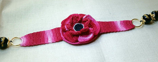 Bracelet Anémone dégradé de rouge perles d'onyx sculpté dragon doré